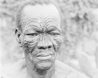 Mbuya-man with typical facial scarifications